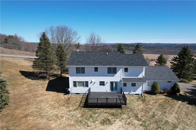 123 Sunset Ridge Rd, Otsego, NY 13326 - rear view of house featuring a deck and a yard