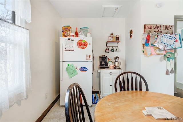 dining room with baseboards