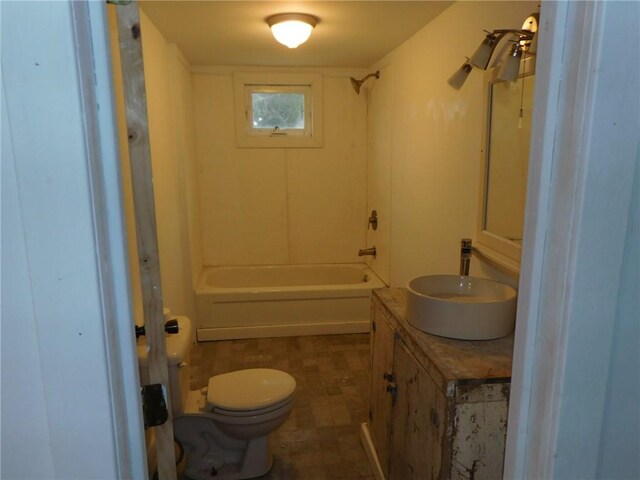 full bathroom with shower / washtub combination, toilet, and vanity