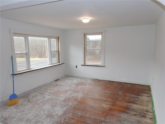 spare room featuring visible vents