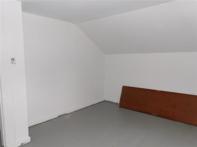 additional living space with lofted ceiling