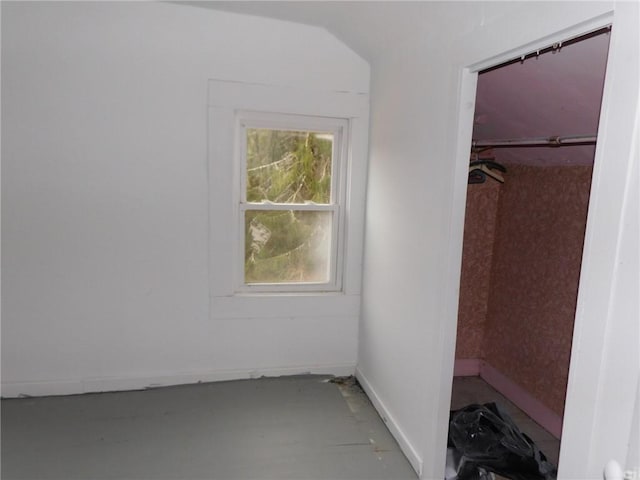 interior space featuring baseboards