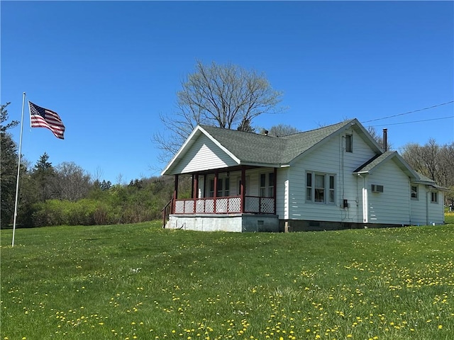 7 Hedgehog Ln, Bradford-Town, PA 16701 - view of side of home with a porch, a lawn, a shingled roof, and crawl space