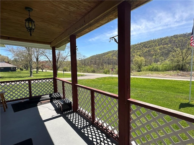 7 Hedgehog Ln, Bradford-Town, PA 16701 - wooden deck with a porch and a yard