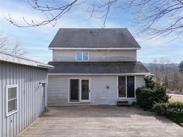 7317 County Highway 33, Kortright, NY 13739 - back of house with roof with shingles and a deck