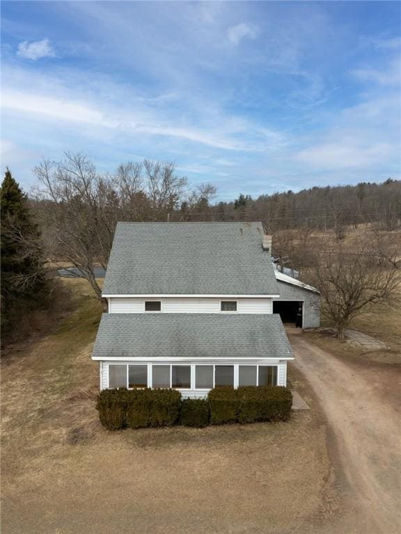 7317 County Highway 33, Kortright, NY 13739 - view of front of property with dirt driveway and roof with shingles