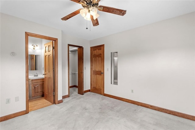 7317 County Highway 33, Kortright, NY 13739 - unfurnished bedroom featuring baseboards, light colored carpet, and a spacious closet