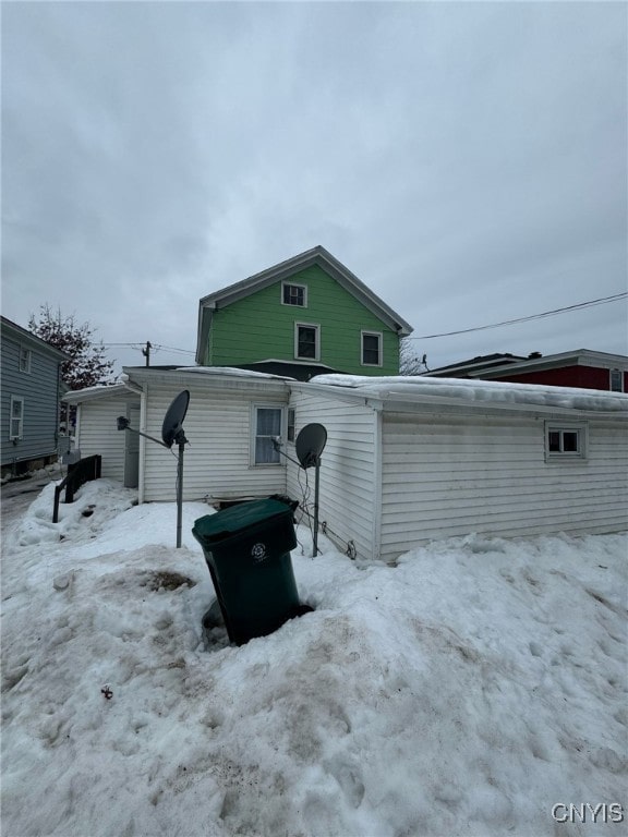 163 E 9th St, Oswego-City, NY 13126 - view of snow covered rear of property