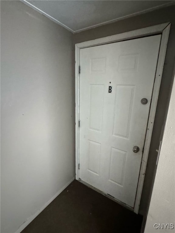 163 E 9th St, Oswego-City, NY 13126 - doorway to outside with baseboards