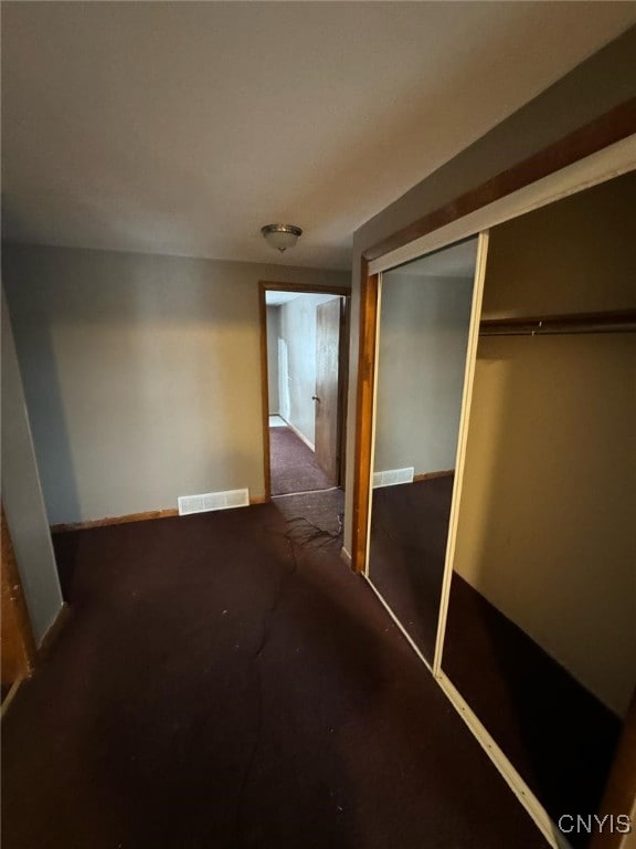 163 E 9th St, Oswego-City, NY 13126 - hall with baseboards, visible vents, and carpet