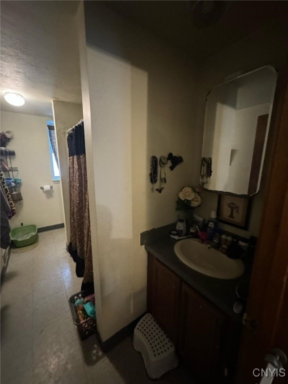 163 E 9th St, Oswego-City, NY 13126 - bathroom featuring vanity and tile patterned floors