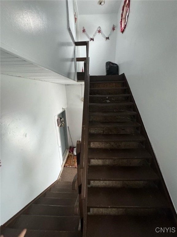 163 E 9th St, Oswego-City, NY 13126 - staircase with baseboards