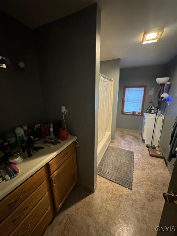 163 E 9th St, Oswego-City, NY 13126 - bathroom featuring curtained shower