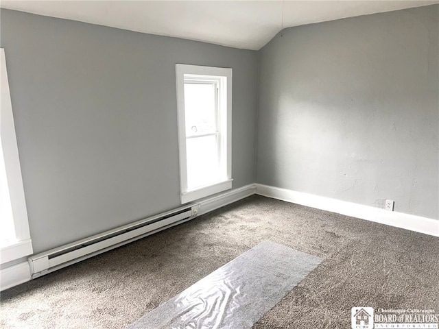 298 S Main St, Jamestown, NY 14701 - unfurnished room featuring baseboards, lofted ceiling, baseboard heating, and carpet flooring