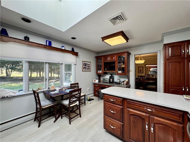 4 Ravine Park N, Oneonta-City, NY 13820 - kitchen with crown molding, light wood-type flooring, light countertops, glass insert cabinets, and an office area