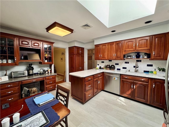 4 Ravine Park N, Oneonta-City, NY 13820 - kitchen with dishwasher, light wood-style flooring, glass insert cabinets, a peninsula, and decorative backsplash