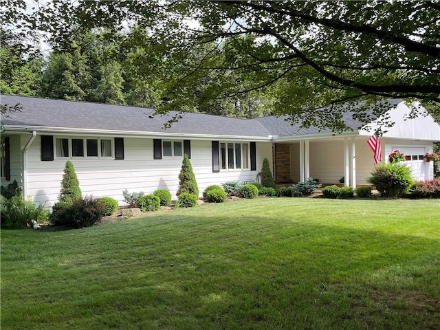 4 Ravine Park N, Oneonta-City, NY 13820 - ranch-style house featuring a garage, a front lawn, and roof with shingles