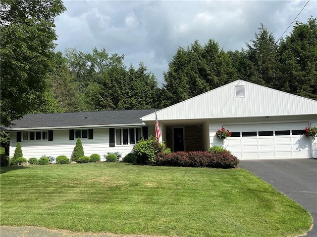 4 Ravine Park N, Oneonta-City, NY 13820 - ranch-style house with an attached garage, asphalt driveway, and a front lawn