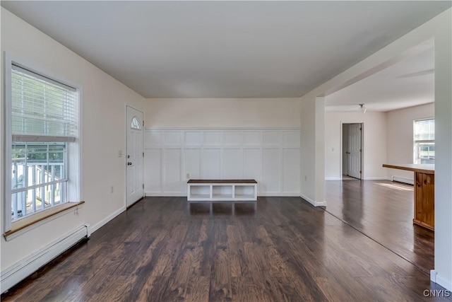 36194 State Route 180, Orleans, NY 13656 - interior space featuring dark wood finished floors, baseboards, and baseboard heating