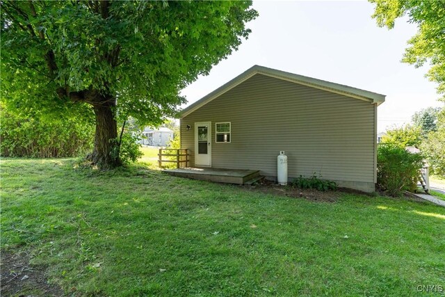 36194 State Route 180, Orleans, NY 13656 - back of property featuring a lawn and a deck