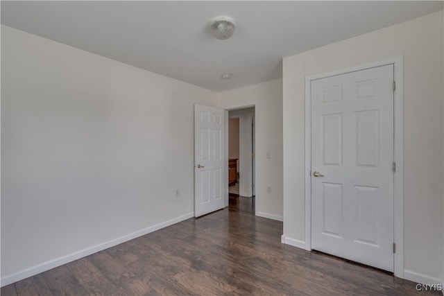 36194 State Route 180, Orleans, NY 13656 - unfurnished bedroom featuring dark wood finished floors and baseboards