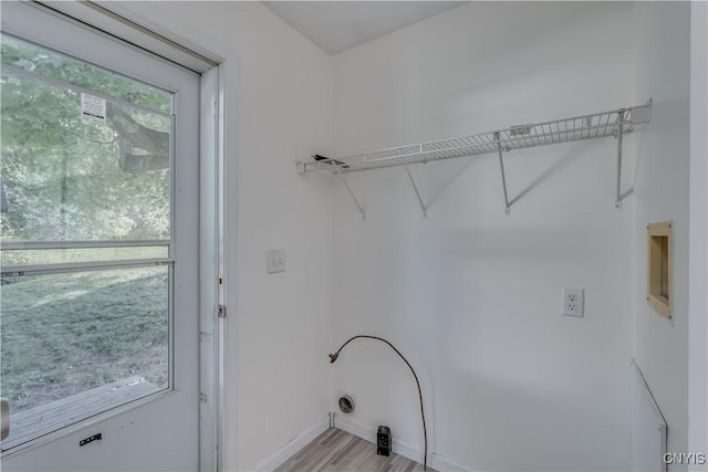 36194 State Route 180, Orleans, NY 13656 - clothes washing area with laundry area, light wood-style floors, and baseboards