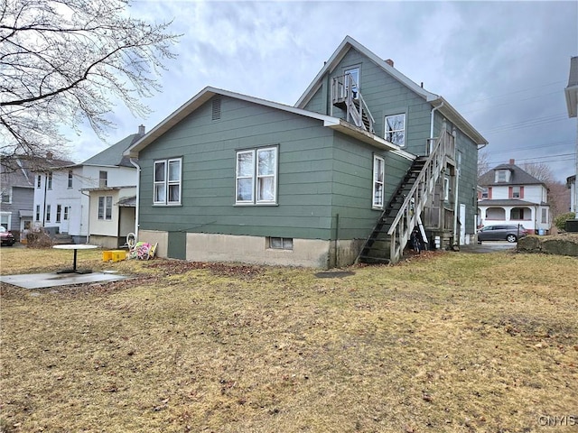 220 Odell Ave, Union, NY 13760 - view of side of home featuring stairs and a yard