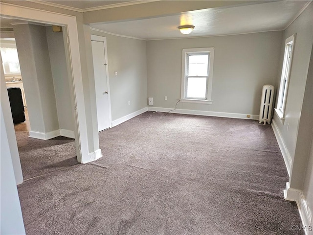 220 Odell Ave, Union, NY 13760 - unfurnished room featuring radiator heating unit, baseboards, dark carpet, and ornamental molding