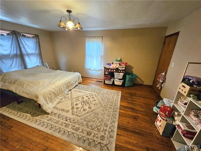 220 Odell Ave, Union, NY 13760 - bedroom featuring a chandelier and hardwood / wood-style flooring