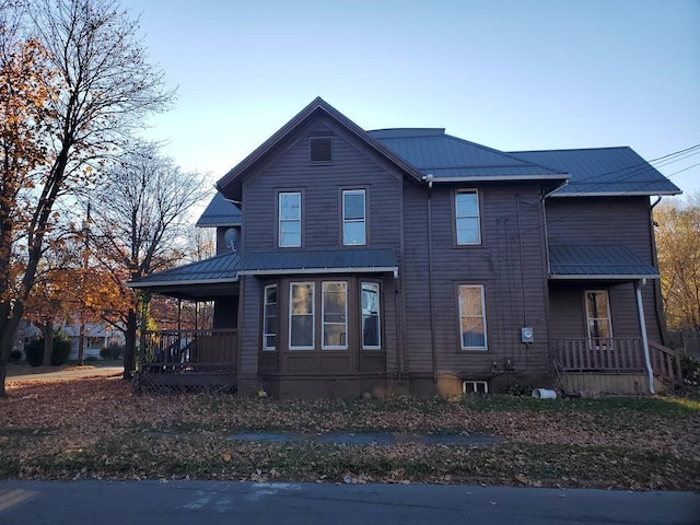 460 S Ave, Elmira-City, NY 14904 - view of front of house featuring metal roof and covered porch