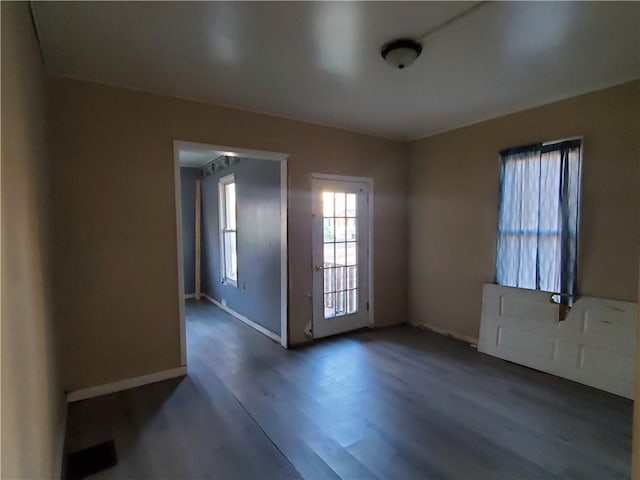 460 S Ave, Elmira-City, NY 14904 - spare room with baseboards and wood finished floors