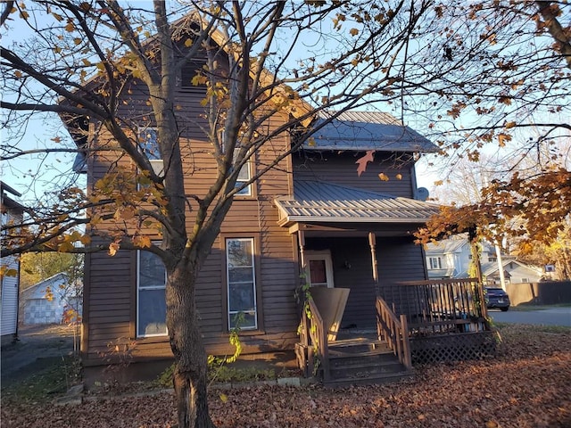 460 S Ave, Elmira-City, NY 14904 - view of front facade with metal roof and covered porch