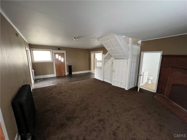 13 Birdsall St, Norwich-City, NY 13815 - additional living space with dark colored carpet, baseboards, and radiator