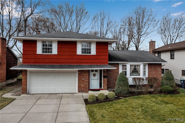 view of front of home with driveway, roof with shingles, a front yard, an attached garage, and brick siding
