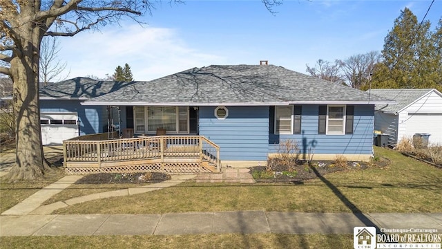 92 E Pine St, Dunkirk-City, NY 14048 - single story home featuring covered porch, a front lawn, roof with shingles, and an outdoor structure