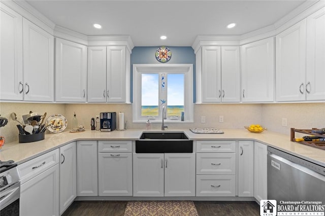 92 E Pine St, Dunkirk-City, NY 14048 - kitchen with a sink, light countertops, white cabinetry, and stainless steel appliances