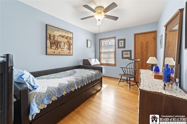 92 E Pine St, Dunkirk-City, NY 14048 - bedroom featuring light wood-style floors and a ceiling fan