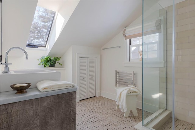 196 Wellington Ln, Springfield, NY 13326 - full bath featuring a stall shower, lofted ceiling, and a closet