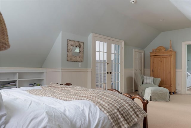 196 Wellington Ln, Springfield, NY 13326 - carpeted bedroom with french doors, vaulted ceiling, and wainscoting