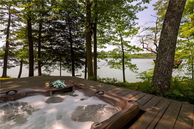 196 Wellington Ln, Springfield, NY 13326 - wooden deck with a water view