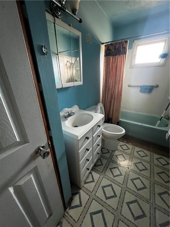 full bathroom with vanity, tile patterned floors, shower / tub combo, and toilet