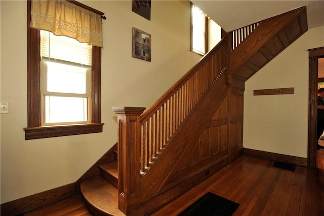 331 W Washington Ave, Elmira-City, NY 14901 - staircase with baseboards and hardwood / wood-style floors