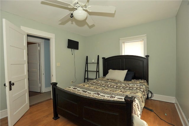 331 W Washington Ave, Elmira-City, NY 14901 - bedroom with ceiling fan, baseboards, and wood finished floors