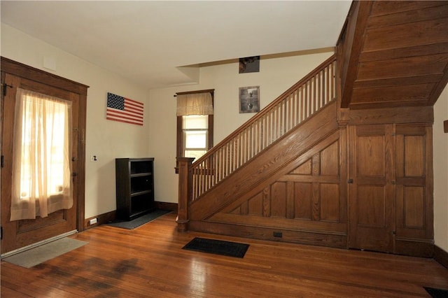 331 W Washington Ave, Elmira-City, NY 14901 - foyer entrance with baseboards, stairs, and hardwood / wood-style flooring