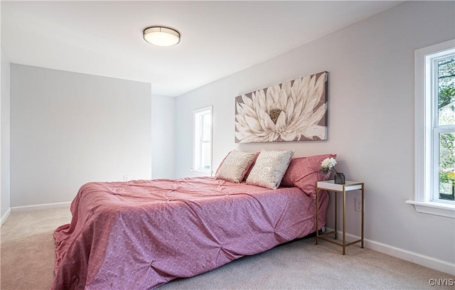 806 Clifford Ave, Vienna, NY 13157 - bedroom featuring baseboards and carpet