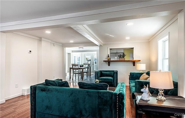 806 Clifford Ave, Vienna, NY 13157 - living area featuring a wealth of natural light, baseboards, wood finished floors, and recessed lighting