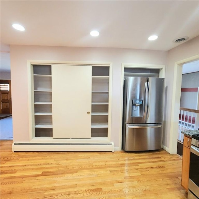 919 W Broad St, Horseheads, NY 14845 - kitchen with light wood-style flooring, appliances with stainless steel finishes, visible vents, stone countertops, and recessed lighting
