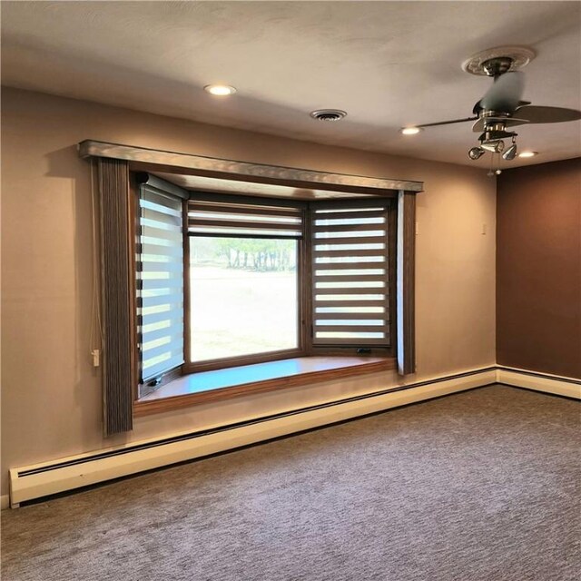919 W Broad St, Horseheads, NY 14845 - carpeted empty room with recessed lighting, baseboard heating, baseboards, visible vents, and a ceiling fan