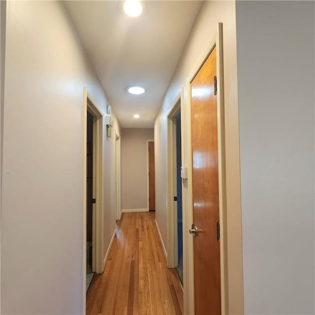 919 W Broad St, Horseheads, NY 14845 - hallway featuring baseboards, recessed lighting, and light wood finished floors