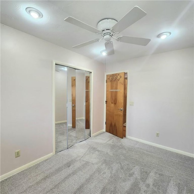 919 W Broad St, Horseheads, NY 14845 - unfurnished bedroom featuring baseboards, ceiling fan, and carpet